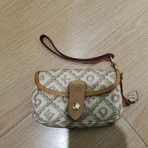 Dooney & Bourke cream colored clutch